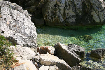 Místo pro FKK západně od Milny, ostrov Hvar, Chorvatsko