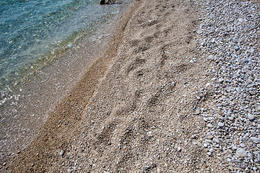 Zaostrog - FKK pláž v západní části letoviska, Chorvatsko