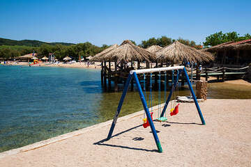 Písečná pláž Planjka, Stará Novalja, ostrov Pag, Chorvatsko