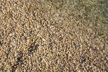 Fažana - oblázková pláž San Lorenzo, Istrie, Chorvatsko