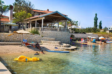 Apartmány Tomislav - restaurace na pláži, Vlašiči, ostrov Pag, Chorvatsko