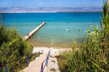 Sabunike - molo u písečné pláže, Zadarská riviéra, Chorvatsko