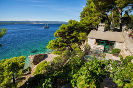 Apartmány Bagarić - venkovní posezení před společným grilem s vybavenou kuchyní, Medići, Chorvatsko