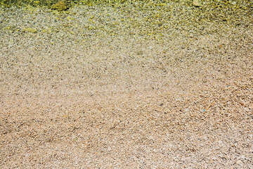 Letovisko Igrane - detail oblázkové pláže v centru, Makarská riviéra, Chorvatsko