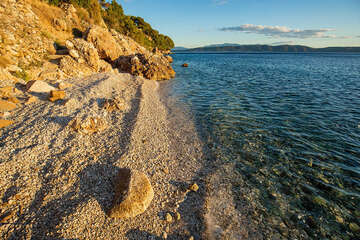 Letovisko Igrane - západní FKK pláže, Makarská riviéra, Chorvatsko