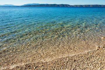 Letovisko Igrane - východní oblázková pláž (blízko parkoviště), Makarská riviéra, Chorvatsko