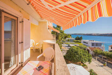 A4 - apartmány Bracera - terasa s pohledem na moře (přístup z kuchyně a z první ložnice), Stará Novalja, ostrov Pag, Chorvatsko