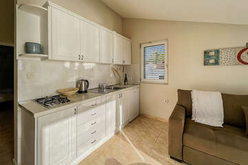 Apartmán typu VMB pro 3–4 osoby, s balkónem s výhledem na moře, Milna, ostrov Brač, Chorvatsko