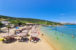 Písečná pláž Planjka, Stará Novalja, ostrov Pag, Chorvatsko