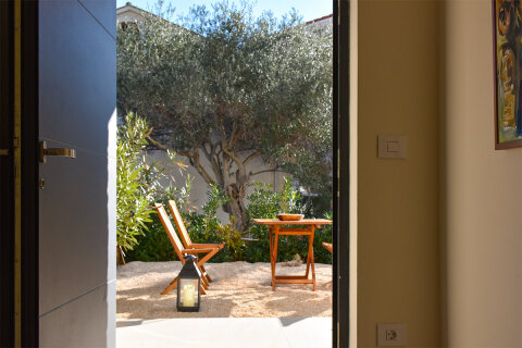 Prázdninový dům Harmonie - terasa v přízemí, Jakišnica, ostrov Pag, Chorvatsko