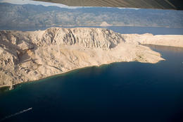 Skály, moře, Ostrov Pag, Chorvatsko 